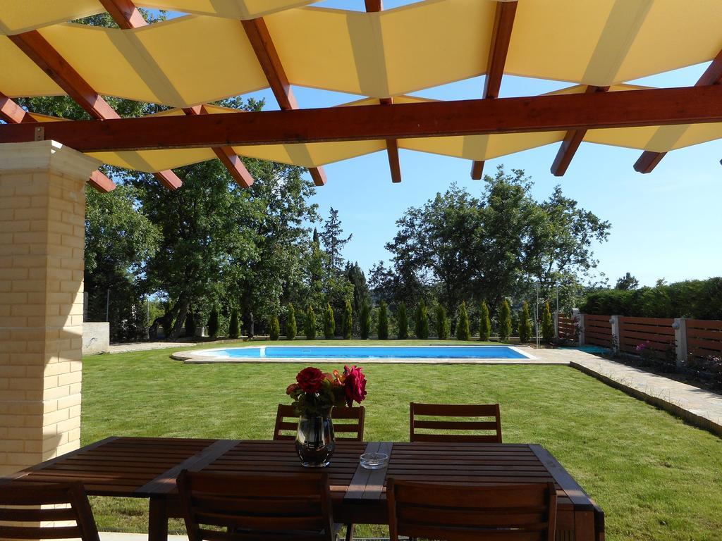 Villa Poulades Gouvia Bagian luar foto