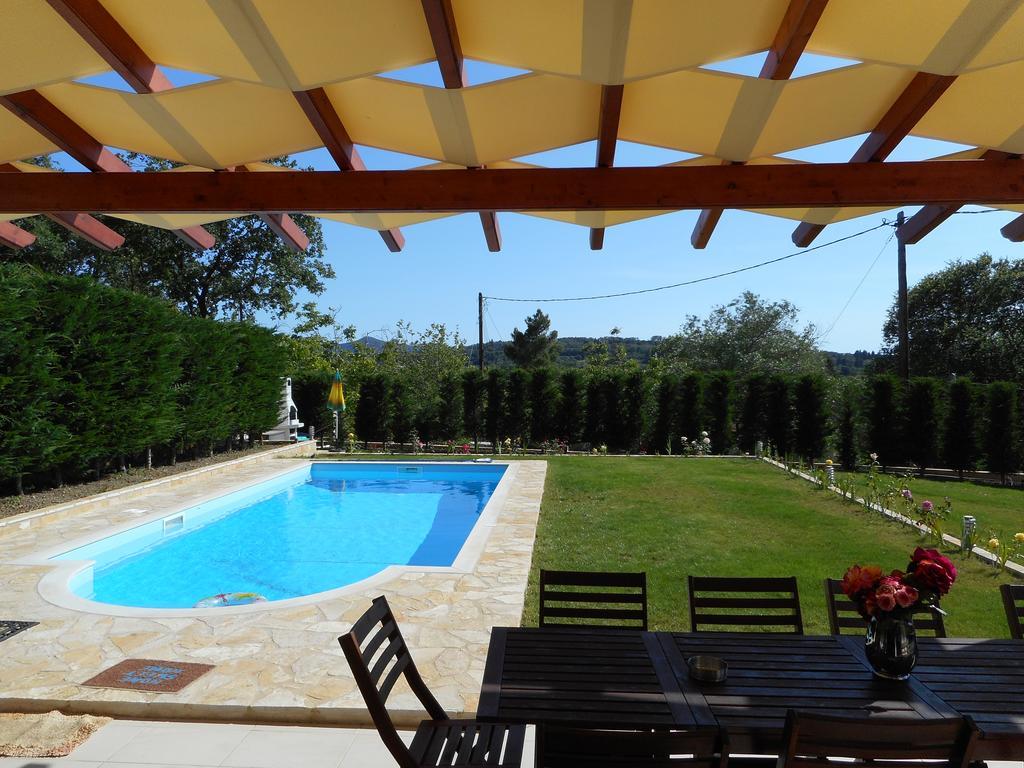 Villa Poulades Gouvia Bagian luar foto